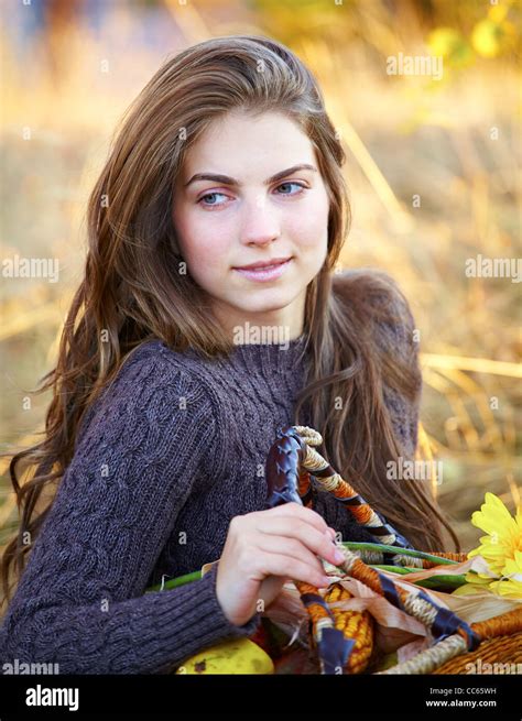 Portrait Of A Beautiful 20 Year Old Young Woman Outdoor During Autumn