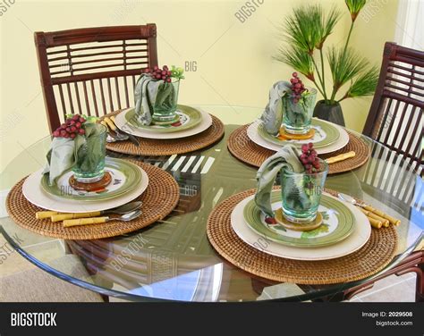 Setting a table is quite simple once you know the basics and luckily it is easy to learn but. Table Setting - Lunch For 4 Stock Photo & Stock Images ...