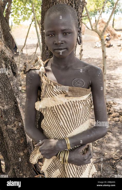 A Traditional Ethiopian Mursi Tribe Young Woman With Beauty Scarring