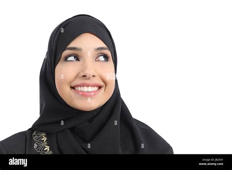 beautiful arab woman face looking an advertising above isolated on a white background stock
