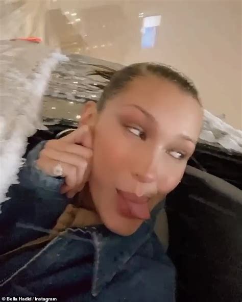Bella Hadid Fashions White Robe Into A Halterneck Top As She Gets Her