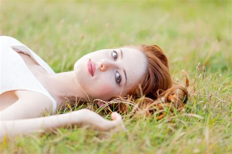 Beautiful Young Woman Lying In The Field And Relaxing Stock Image Image Of Dress Relaxed