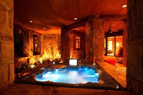Indoor Hot Tub With Fireplace Tv In A Room With A Door Leading To A Pool N Desk Description