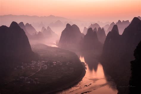 Mountain Landscape In The Mist At Dawn With Li River From