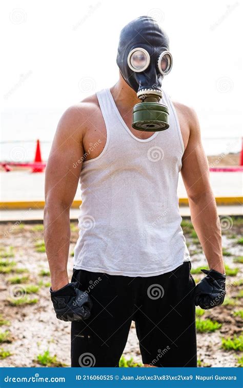 A Muscular Man In A Gas Mask Stock Image Image Of Quarantine