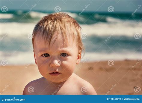 Adorable Infant Boy Looking At Camera At Summertime Young Caucasian