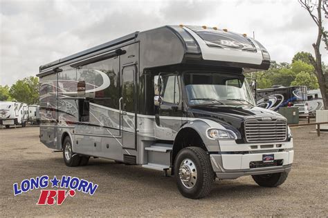 2018 Dynamax Dx3 36fk With Three Slides Open Floorplan With A Rear
