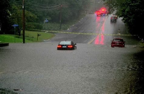 Flooding Prompts Water Rescues Stranded Cars