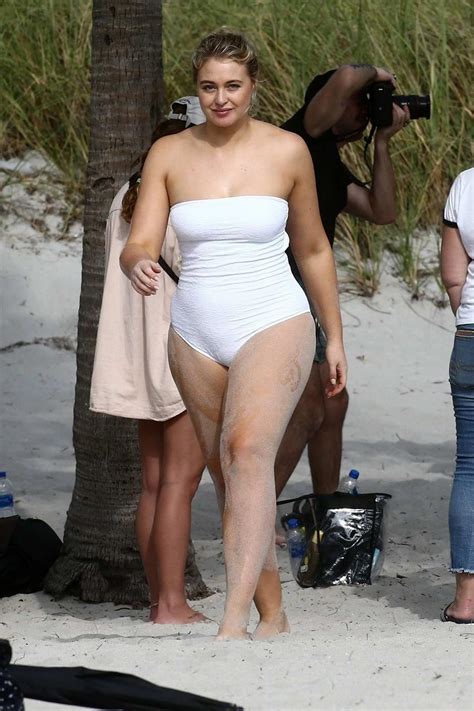 Iskra Lawrence Seen Wearing A White Swimsuit During A Beach Photoshoot