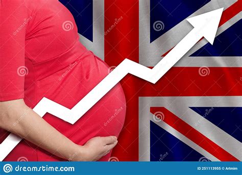 british pregnant woman on flag of united kingdom background birth rate up stock image image