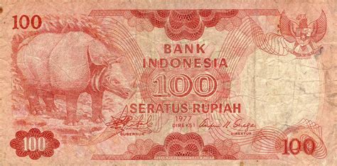 Uang berasal dari uang komoditas, tetapi hampir… gambar uang seratus ribu. Uang kertas Rp. 100 (seratus) Rupiah Indonesia bergambar ...