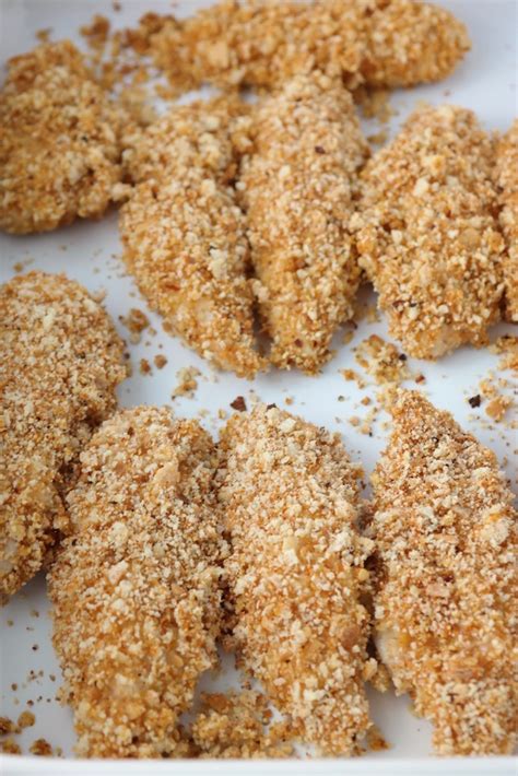 Flip the chicken tenders over and continue brushing with the oil or butter and sprinkle the 2nd side with chicken rub. Baked Chicken Tenders | Our Crafty Kitchen (Recipes ...