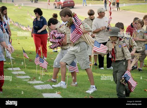 Boy Scouts placing American flags on graves, Memorial Day, Chattanooga