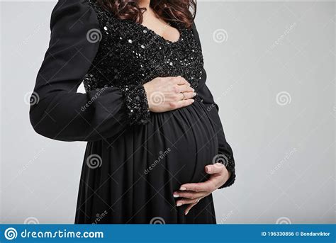 Pregnant Woman Hugs Her Belly Stock Photo Image Of Bare Mommy 196330856