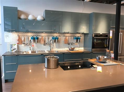 The swedish retailer recently engineered kitchen cabinets that are made from reclaimed industrial wood and recycled plastic bottles. IKEA Kitchen- Gray Turquoise Cabinets, but I would use a ...