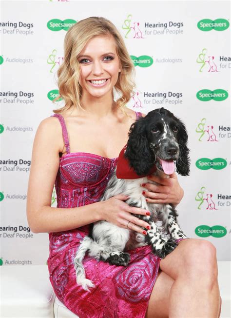 Rachel Riley Teases Cleavage In Low Cut Dress As She Poses With Pooch
