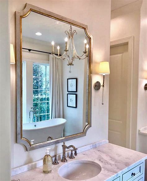 Bathroom mirrors and shaving mirrors are a practical addition to any bathroom. Tulip Silver And Gold Wall Mirror (With images) | Gold ...