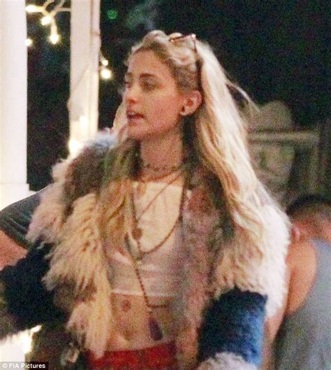 Paris Jackson Bares Taut Midriff In Crop Top And Faux Fur Coat As She