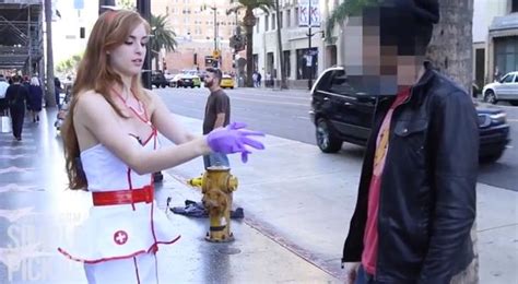 Woman Dressed As Sexy Nurse Gives Testicular Exams In Publicbut