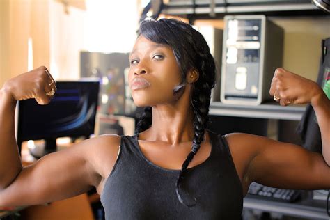 Strong Woman Flexing Biceps Muscles High Quality Free