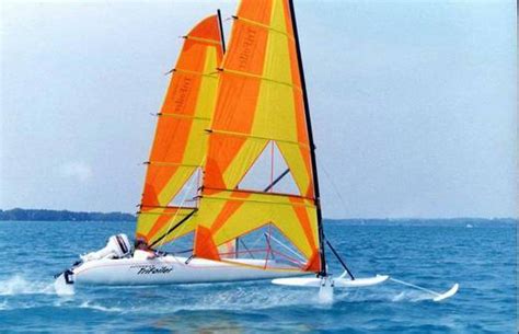 Since 1950, hobie has been in the business of shaping a unique lifestyle based around fun, water, an. Research Hobie Cat Boats Trifoiler Racing Sailboat Boat on ...