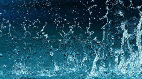 Abstract Water Splashes Isolated On Blue Background Stock Photo Image