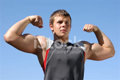 Flexing Biceps Stock Photo Royalty Free Freeimages