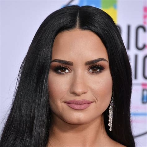 it s the dead of winter but demi lovato s sexy swimsuit selfie proves she dgaf brit co