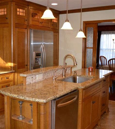 Craftsman Style Kitchen With Raised Ledge At The Island To Hide The