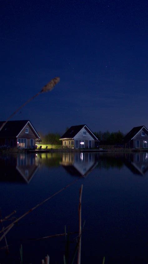2160x3840 Houses At Lake Water Starry Night 5k Sony Xperia Xxzz5