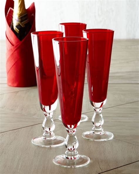 Four Red Champagne Flutes