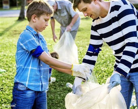 Download Premium Image Of Kids Picking Up Trash In The Park 431047