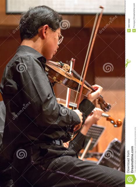 Violonist Playing In A Classical Music Concert China Editorial