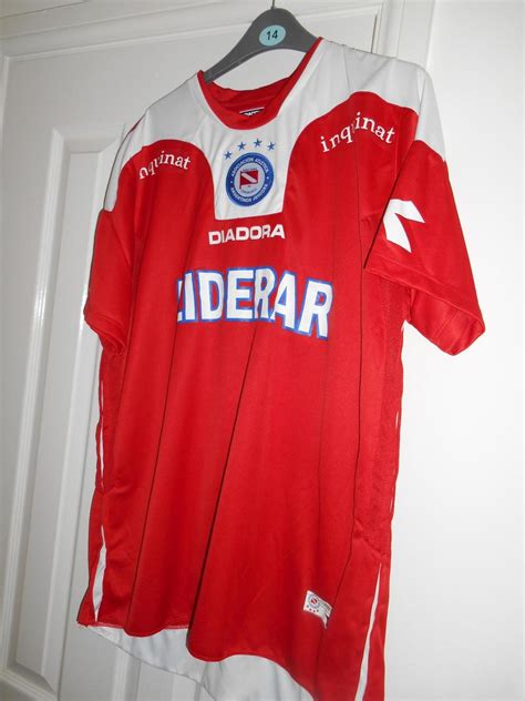 Detailed info on squad, results, tables, goals scored, goals argentinos juniors's home form is poor with the following results : Argentinos Juniors Home Camiseta de Fútbol 2009 - 2010.