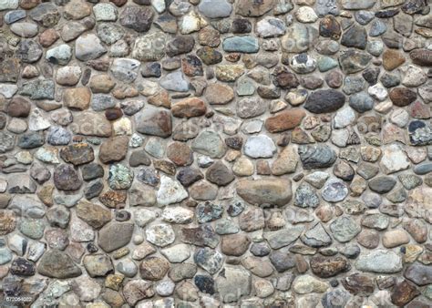 Stone Wall Fieldstone And Concrete Natural Building Texture Stock Photo