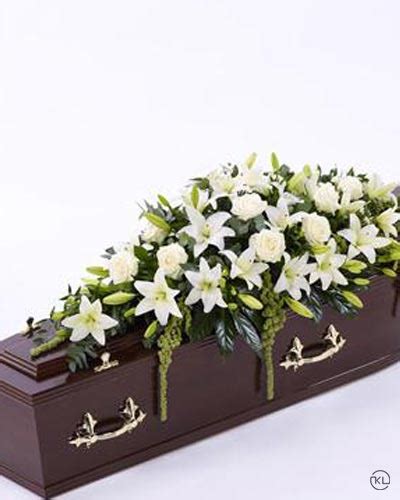 White Lily And Rose Casket Spray Funeral Flowers London