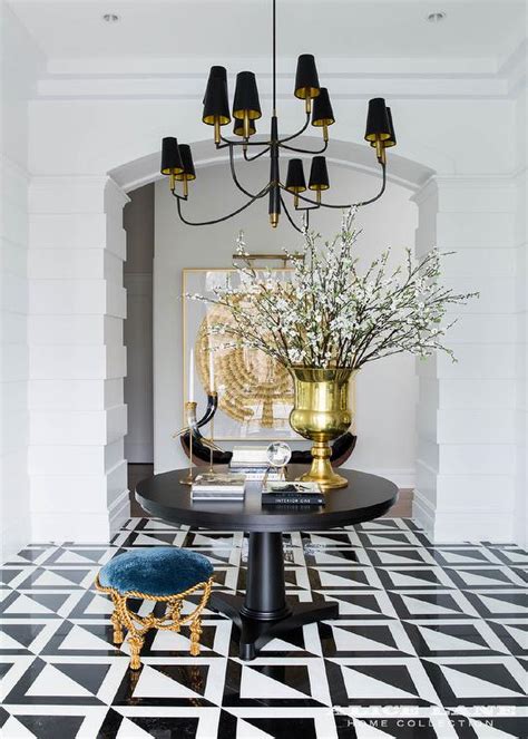 black pedestal entry table  black tiered