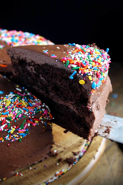 A simple, moist, layered chocolate cake, filled with dark chocolate mousse, and then a warm chocolate frosting poured on top! Classic Chocolate Birthday Cake | wyldflour