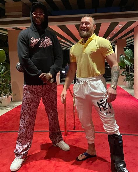Conor Mcgregor Wearing A Dolce And Gabbana Polo With Versace Sandals