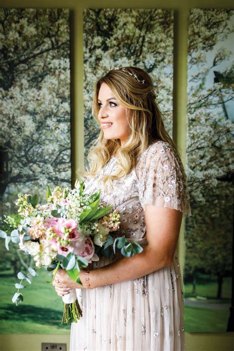 She is passing the electronic scanning wand over identifying mark on package. How Much Do Wedding Flowers Cost Ireland - Wedding Gallery