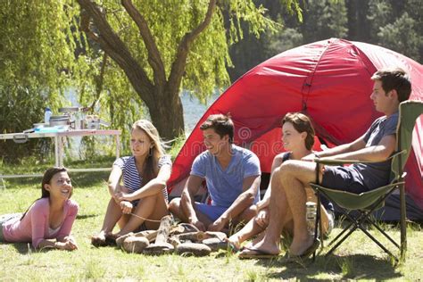 Group Of Young People On Camping Holiday Together Stock Photo Image