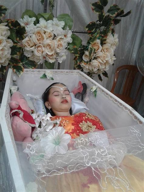 This video shows beautiful women in their funeral caskets! The gallery for --> Women In Caskets