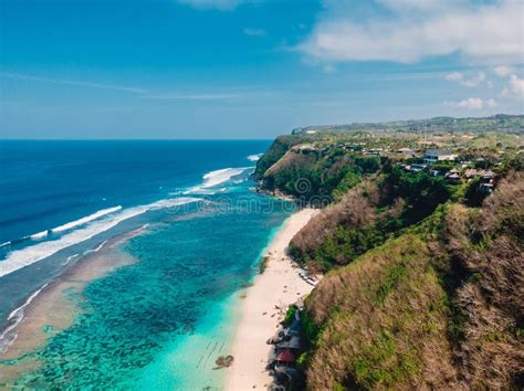 Beautiful Cliff Beach And Blue Ocean In Bali Aerial View Stock Photo