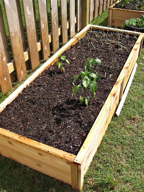 I wish i could diy these raised bed garden as they did. Ana White | Ten Dollar Cedar Raised Garden Beds - DIY Projects
