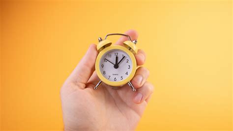Download Wallpaper 2560x1440 Watch Alarm Clock Time Hand Yellow