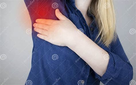 A Woman Suffers From Pain In The Armpit Sweating Unpleasant Odor