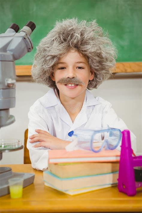 Student Dressed Up As Einstein Using a Chemistry Set Stock Photo ...