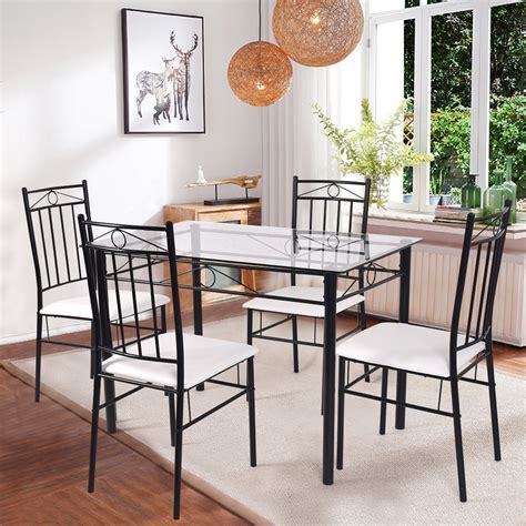 【upgraded upholstered cushion】this dining table set includes 1 dining table and 4 upholstered dining chairs,the contemporary faux leather classical 1 table and 4 chairs with large load capacity to greatly suit your needs. Costway 5 Piece Dining Set Glass Metal Table and 4 Chairs ...