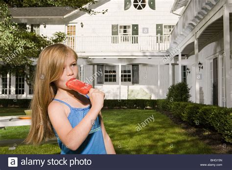 Young Girl Sucking Ice Lolly Stockfotos And Young Girl Sucking Ice Lolly