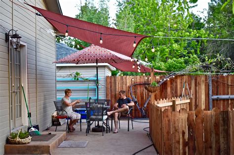 Outdoor living space with sheer. DIY shade Sails | Diy shades, Shade sail, Outdoor decor